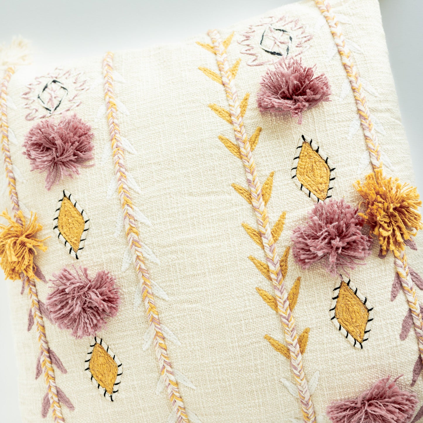 Embroidered Pillow with Tassels