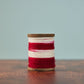 Red and Cream Spool of Wool